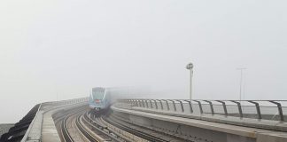 Photo: Dubai Metro emerging out of a thick blanket of fog that covered the city on Thursday morning.