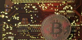 Bitcoin surges above $12,000 to record high